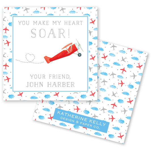 The image is a greeting card featuring a red airplane and a heart shape, with the text "You make my heart soar!" and "Your friend, John Harbor".
