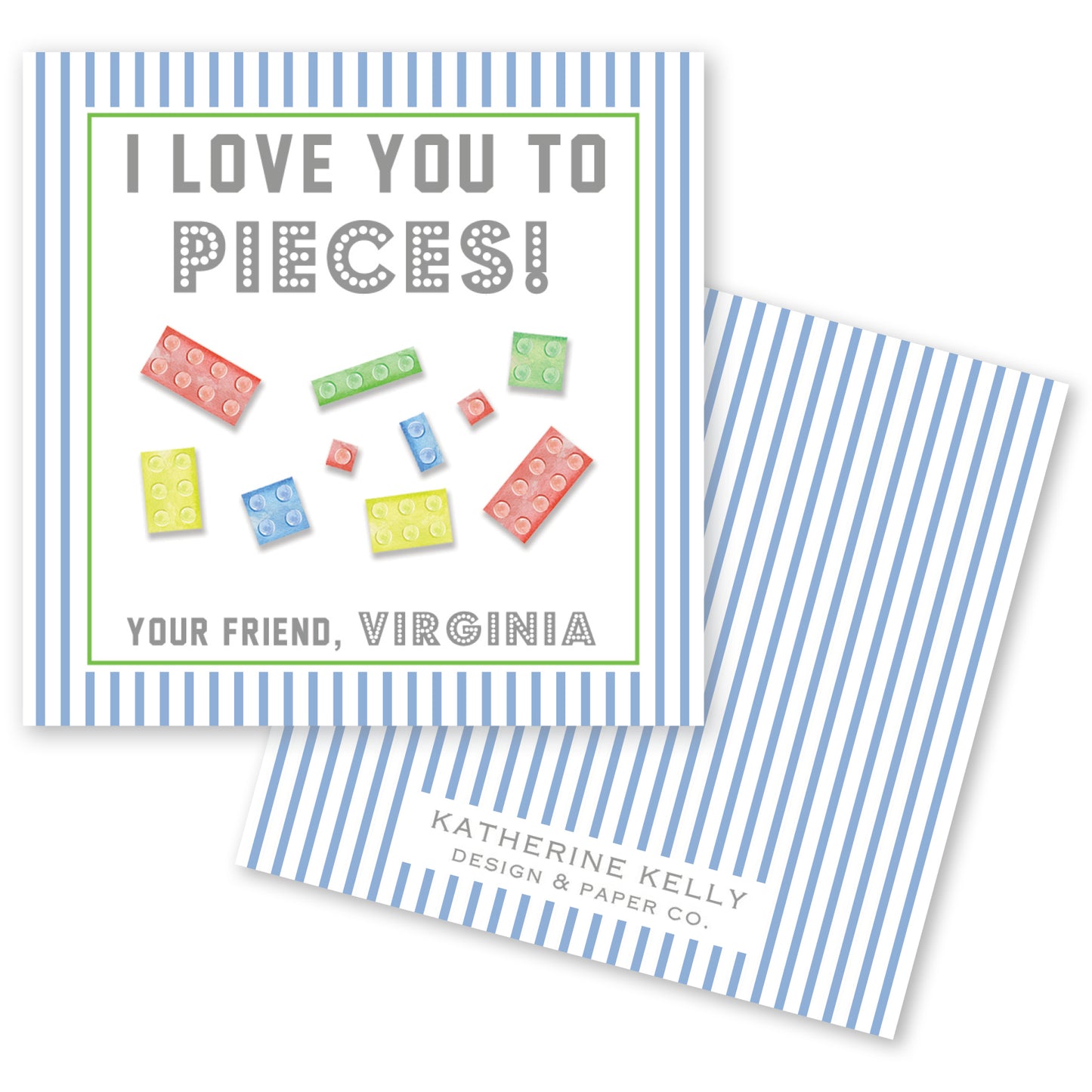 The image is a greeting card with a blue and white striped background. The card features a message that reads "I LOVE YOU TO PIECES!" and includes illustrations of various colored Lego bricks. The card also includes text that says "Your Friend, Virginia" and "Katherine Kelly Design & Paper Co."