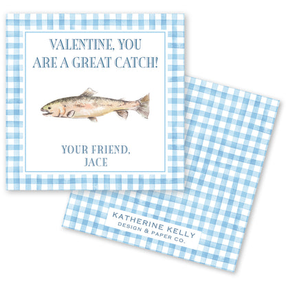 The image is a Valentine's Day card with a blue and white checkered border. The card features a fish illustration and a message that reads "Valentine, you are a great catch!" The card also includes a name and logo for "Katherine Kelly Design & Paper Co."