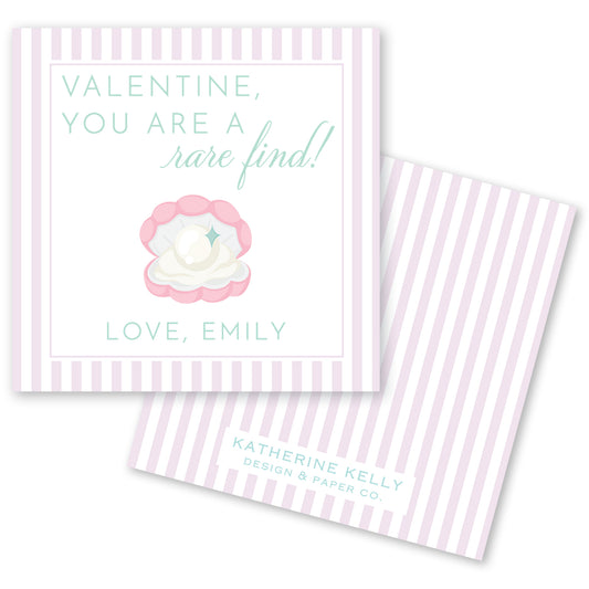 a Valentine's Day card with a pink and white striped background. The card features a message that reads "Valentine, you are a rare find! Love, Emily" along with an illustration of a pearl in an oyster shell. The card also includes the text "KATHERINE KELLY DESIGN & PAPER CO."