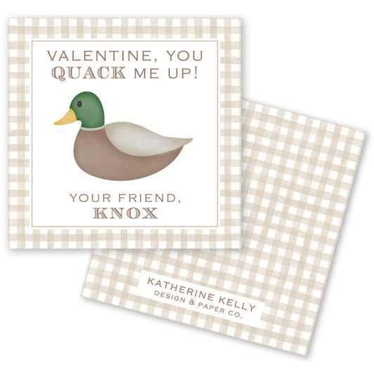 The image is a Valentine's Day card featuring a duck with a green head and brown body. The card has a checkered border and a message that reads "Valentine, you quack me up!" The card also includes a personalized message that says "Your friend, Knox" and the logo of "Katherine Kelly Design & Paper Co."